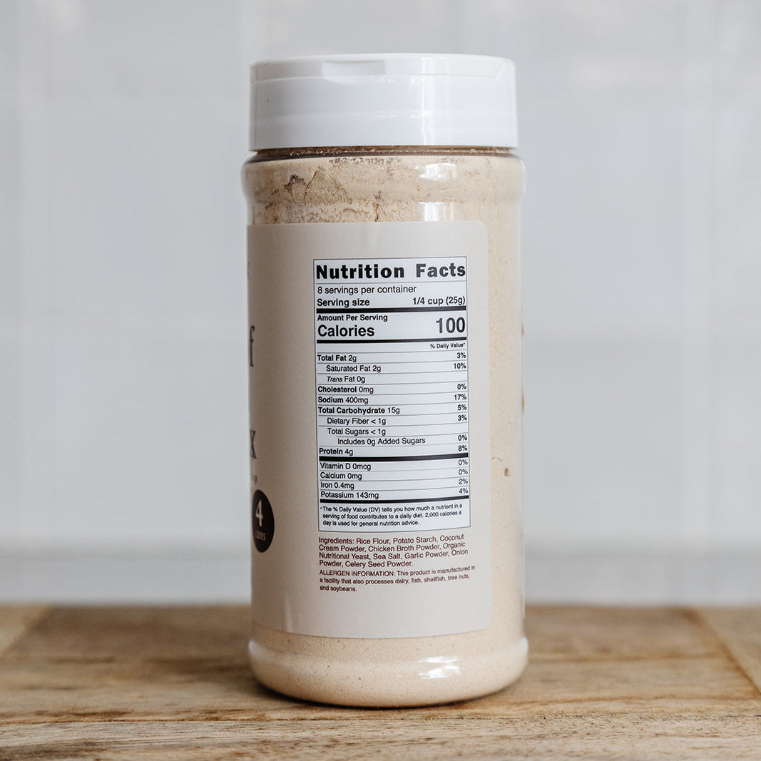 Jar of cream of chicken soup mix on wooden top