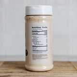 Jar of cream of chicken soup mix on wooden top