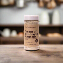 Bottle of Cream of Mushroom Soup Mix on a white background