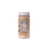 Jar of almond butter with a white lid on a white background