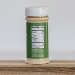 Clean Monday Meals Vegetable Bouillon showing the Nutrition Fact Panel on a wooden surface. 