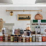 All of Clean Monday Meals products on beautiful cozy kitchen counter 