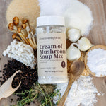 Cream of Mushroom Soup Mix bottle surrounded by ingredients on a wooden surface