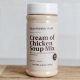 Jar of 'Cream of Chicken Soup Mix' by Clean Monday Meats on a wooden surface with a white background