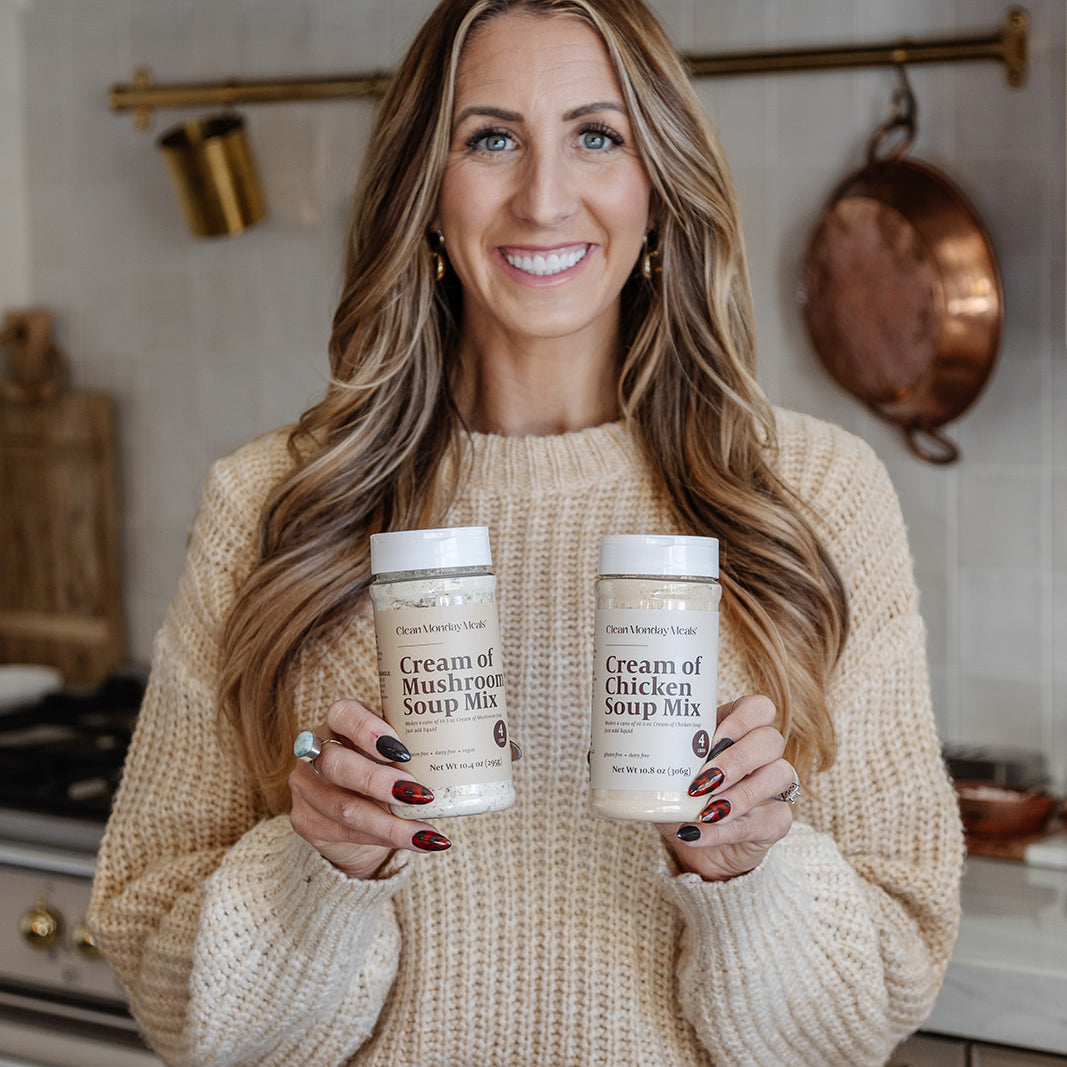 Janae Cox holding a jar of cream of chicken soup mix and cream of mushroom soup mix 