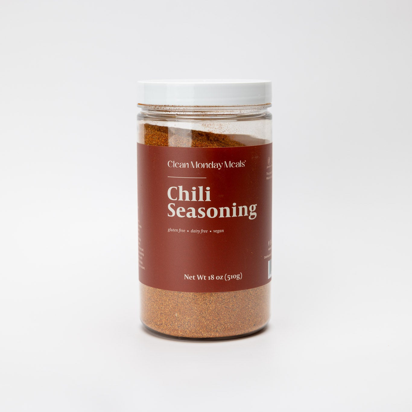 Jar of Chili Seasoning on a white background